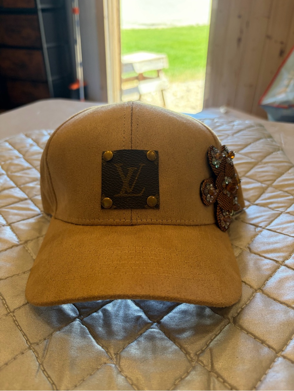 Louis Vuitton Upcycled Patch Tan Suede Cap with Embellished Floral Accent